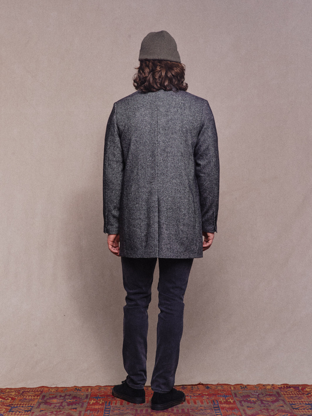 Back model shot of Asuwere Woollen Topcoat in Charcoal