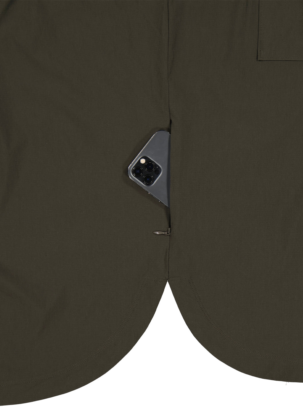 Close up of phone zip pocket on side of lightweight shacket