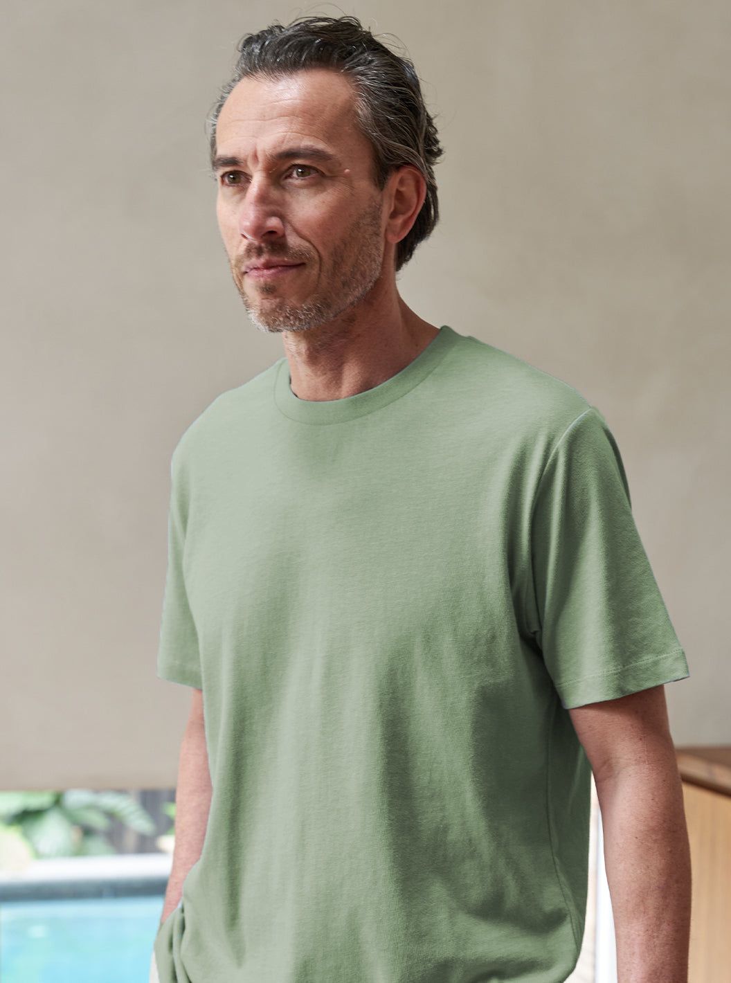 Model wearing Recycled Cotton Tee in Sage
