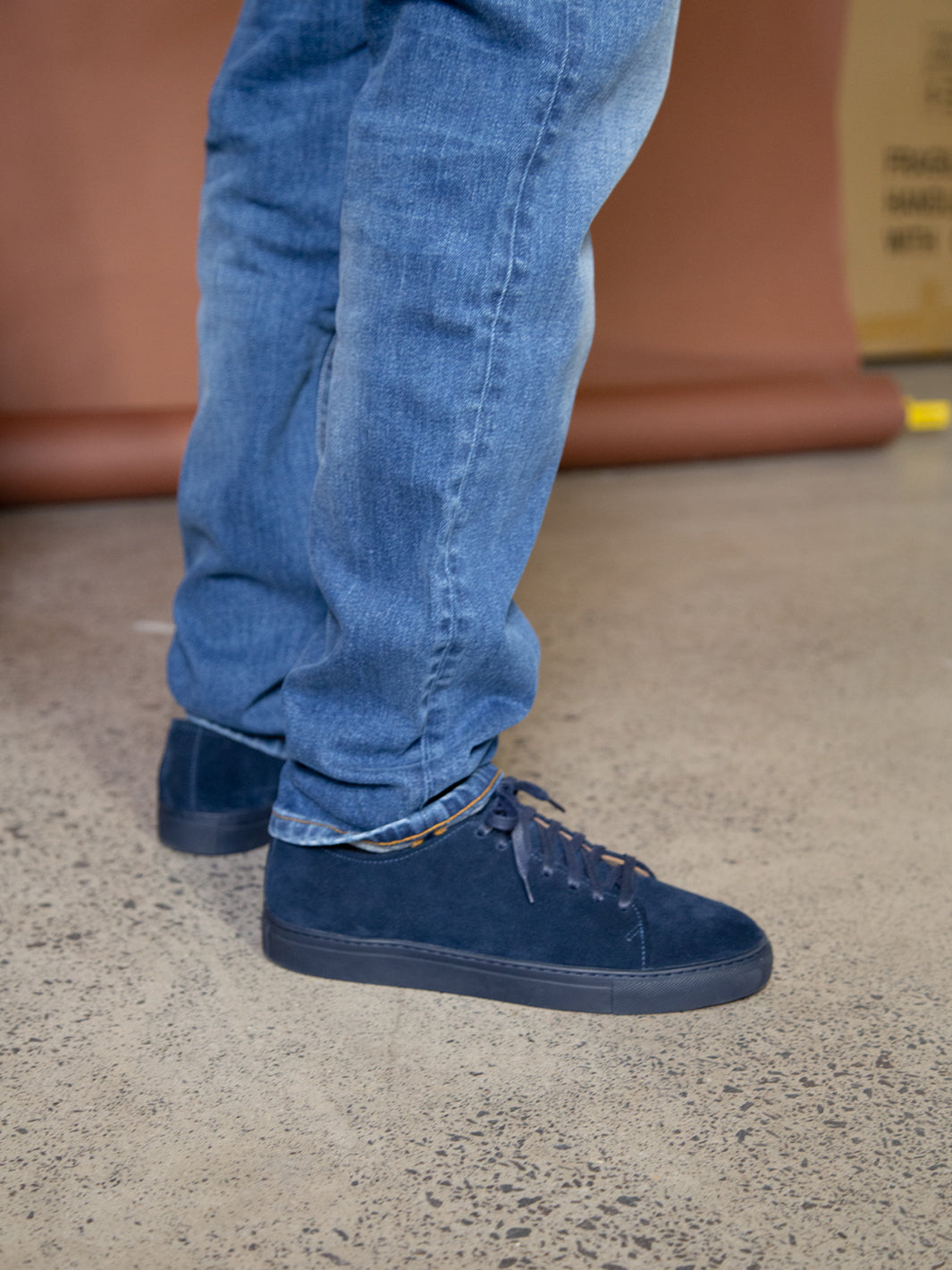 Navy suede leather Asuwere sneaker on model
